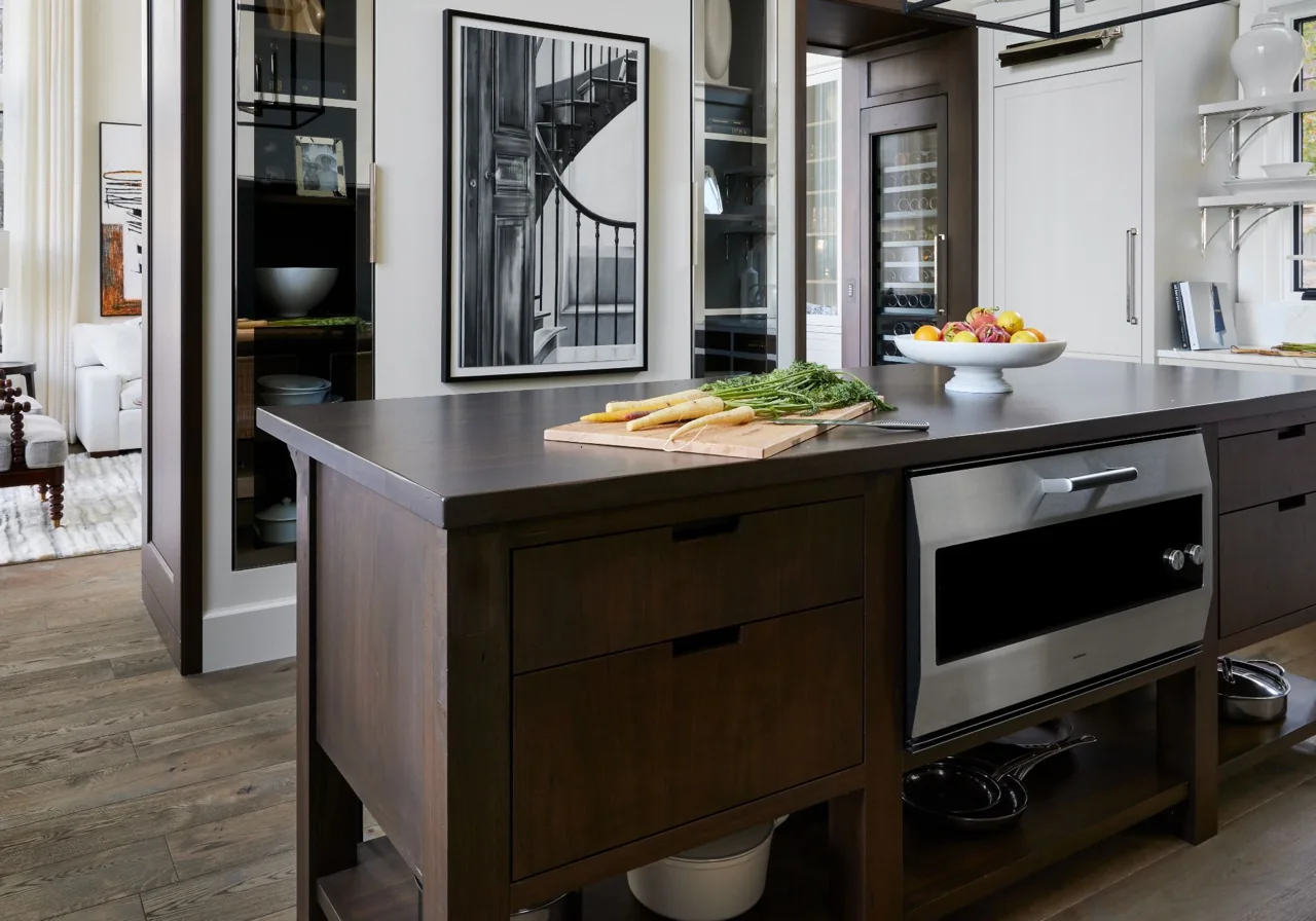 Gaggenau EB333 oven integrated into a dark wood kitchen island