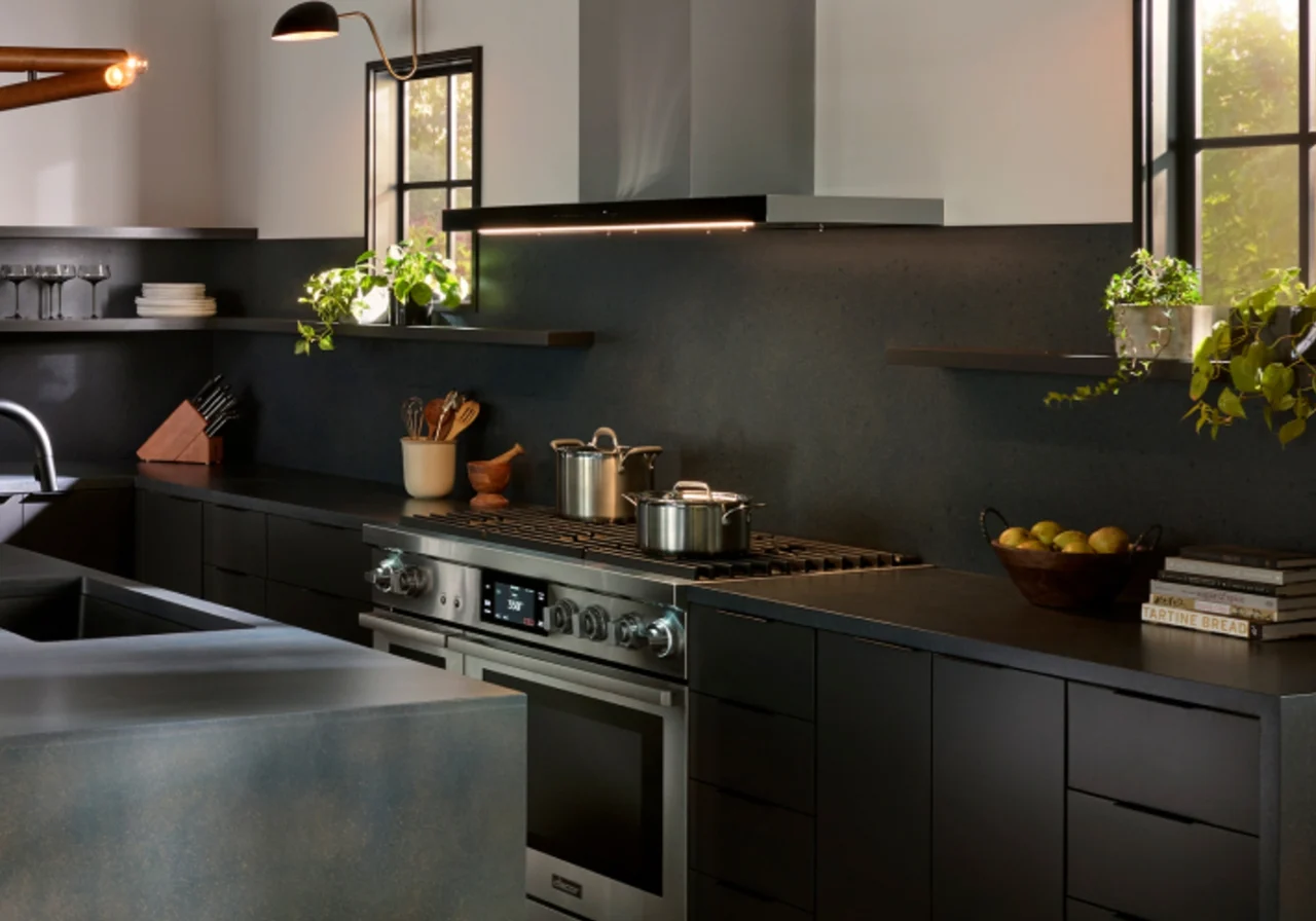Dacor 48-inch range installed in a dark contemporary kitchen