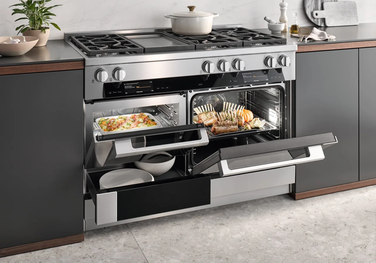 Miele HR 1956-3 G DF GD range with open ovens in a walnut and warm-white kitchen