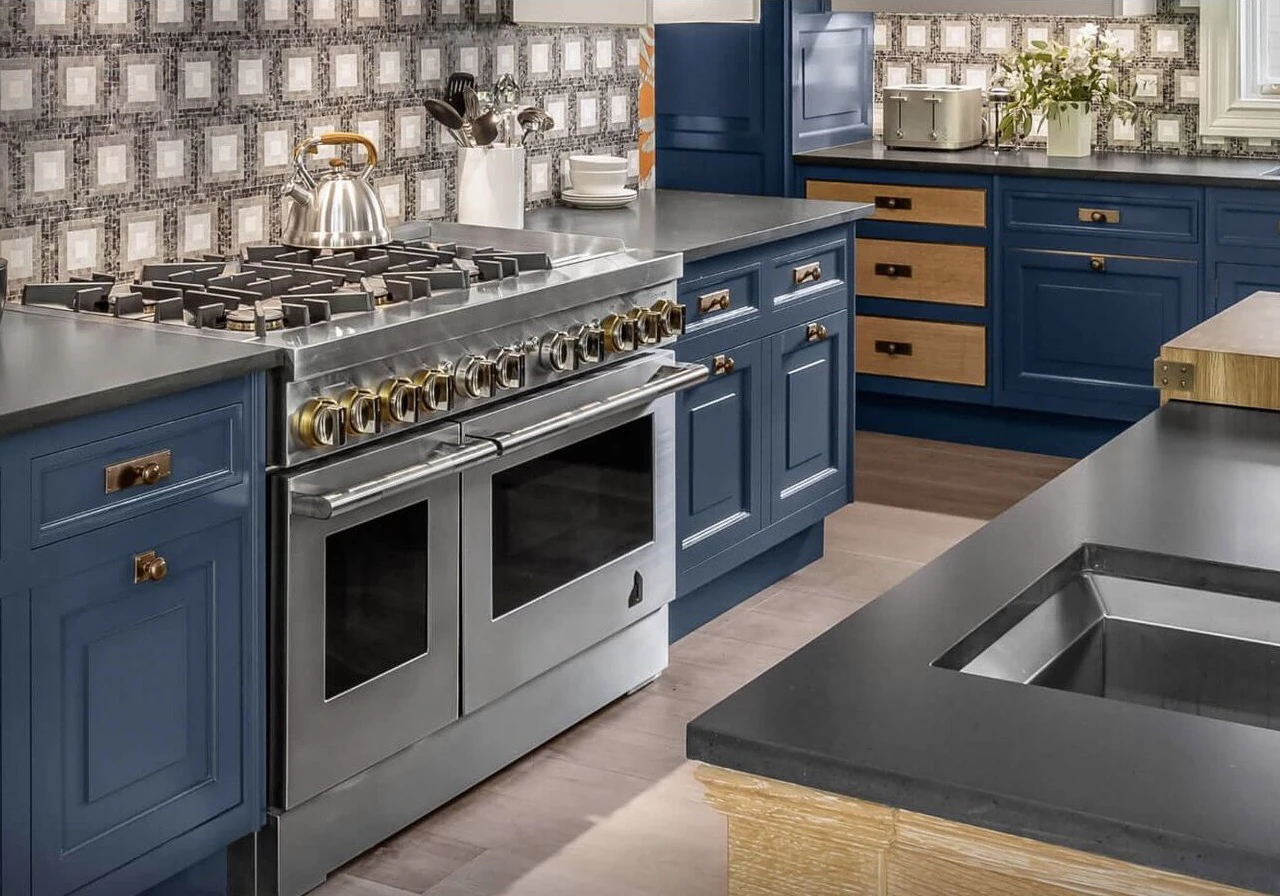 JennAir JDRP548HL dual-fuel range in a blue luxury kitchen
